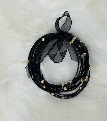 Black and gold bead bracelet stack